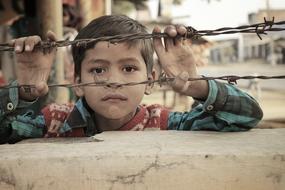 Indian Child barbed wire