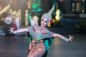 dancer in colorful costume in asia