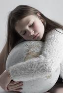 girl hugs the globe
