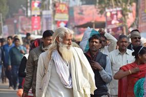 believing Hindu man in white clothes