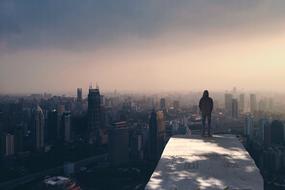 guy over cityscape