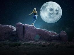 fantastic image of a girl on a rock against the backdrop of a big moon