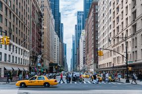 photo of taxi and crosswalk in New York
