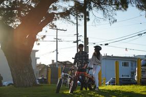 romantic couple with electric bikes