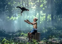 Chicken and Man in forest