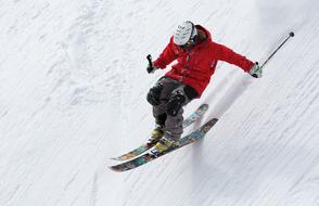 skier on a steep slope close up