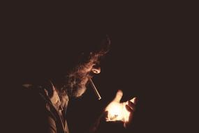 Smoking Lighter at Dark