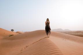 Girl Walking on desert