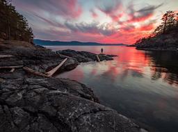 scenic sunset landscape with pink clouds above rocky coastline, Canada, British Columbia, Francis Point Provincial park