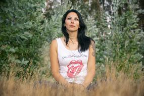 portrait of the gorgeous woman on a meadow