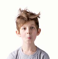 photo of a boy with tousled hair