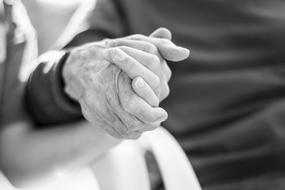 Hands of Old People Holding