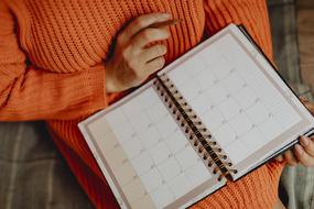 woman with pen and Calendar