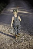 Fishing Boy on road