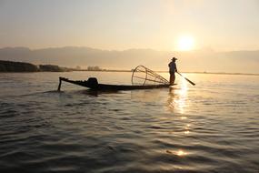 fisherman on a boat on Inle lake