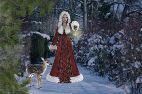 girl in the winter forest as a christmas fantasy