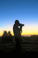 Photographer yellow blue sunset