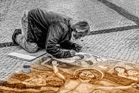 street artist draws an icon