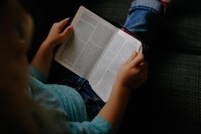 cute girl reading magazine