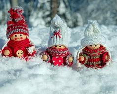 Doll Figures Wooden in the snow close-up