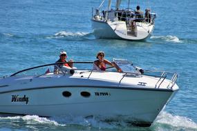 people on a yacht on a sunny day