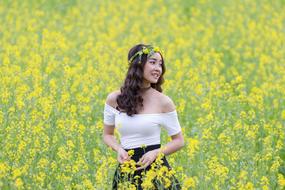 Portrait Girl and Asia yellow Flowers