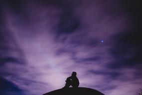 silhouette of a dreaming man