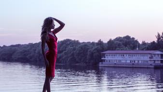 Girl In Red Dress on river