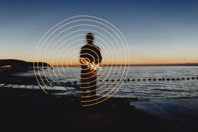 circular lighting effects on the evening beach