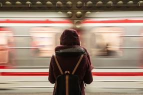 waiting woman in subway station