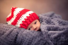 newborn baby in warm hat