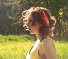 photo profile of a girl with a bright bandage
