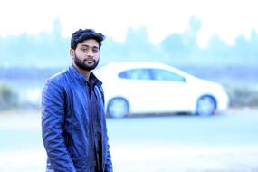 Pakistani man in a leather jacket