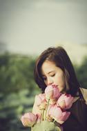 Girl with Lotus Flower Bouquet