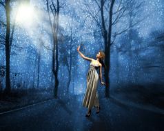woman in a blue forest as a fantasy