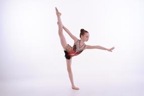 girl is engaged in rhythmic gymnastics