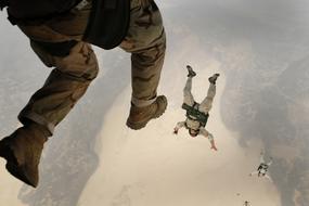 jumping skydivers