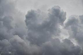 grey fluffy scenic Rain Clouds at sky