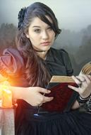 portrait of a gothic girl with a book