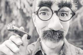 funny character with cigar, black and white