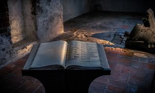 Beautiful, open book in the church in light