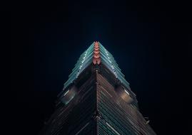 Bottom view of beautiful Taipei 101 with colorful lights in Taipei, Taiwan at night