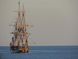 Beautiful and colorful ship, on the waterscape with blue water