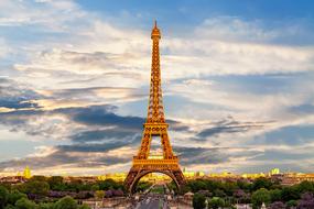 Eiffel Tower in city at scenic sunset, France, Paris