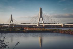 contemporary suspension bridge at dusk