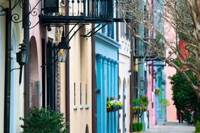 Beautiful and colorful Rainbow Row houses, with the plants, in Charleston, South Carolina, America