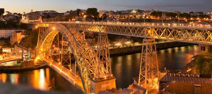 LuÃ­s I Bridge, double-deck metal arch construction at evening city, Portugal, Porto