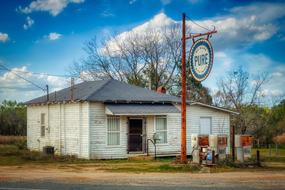 Pure, road sign at Old Gas Station in countryside, usa, georgia