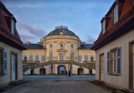 People, near the beautiful, decorated castle in Stuttgart, Germany