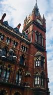 clock tower of aged cathedral in england inLondon